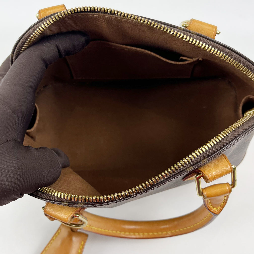 Louis Vuitton Alma BB Monogram Canvas con Finiture in Pelle Naturale