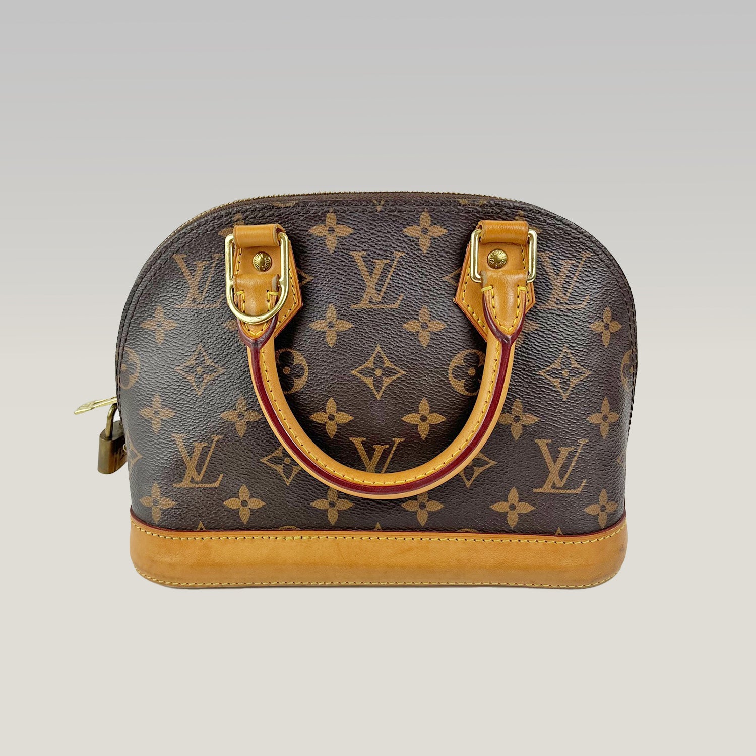 Louis Vuitton Alma BB Monogram Canvas con Finiture in Pelle Naturale