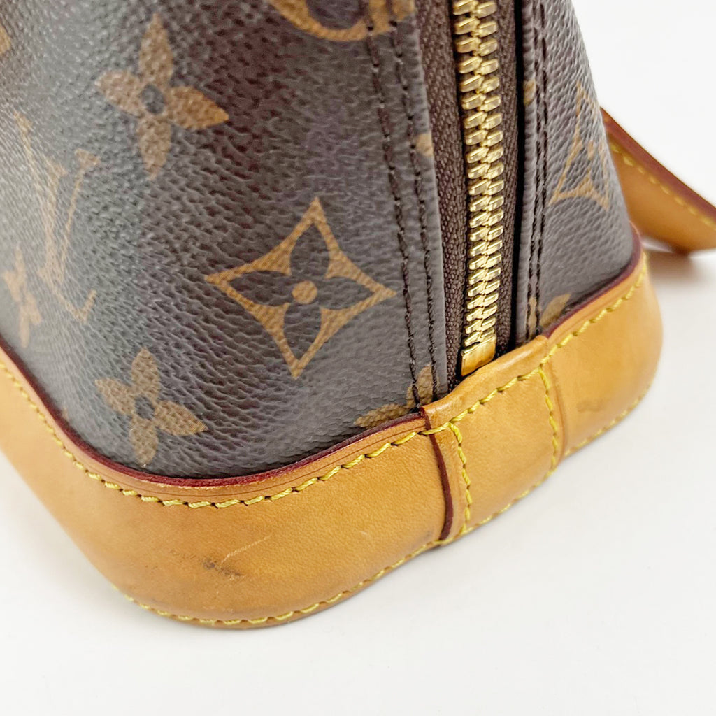 Louis Vuitton Alma BB Monogram Canvas con Finiture in Pelle Naturale