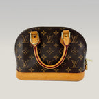 Louis Vuitton Alma Monogram Canvas with Leather Trim