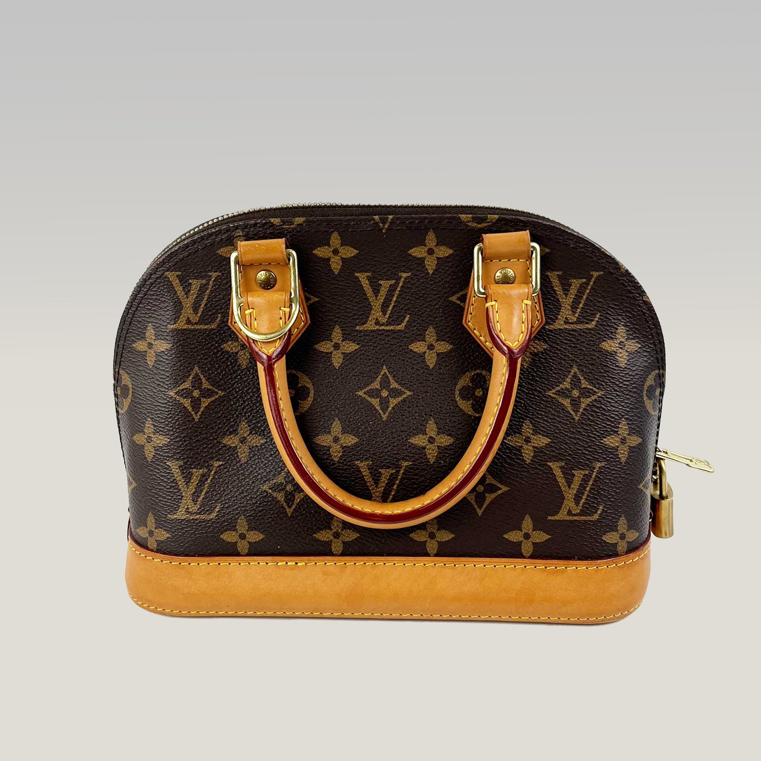 Louis Vuitton Alma Monogram Canvas con Finiture in Pelle