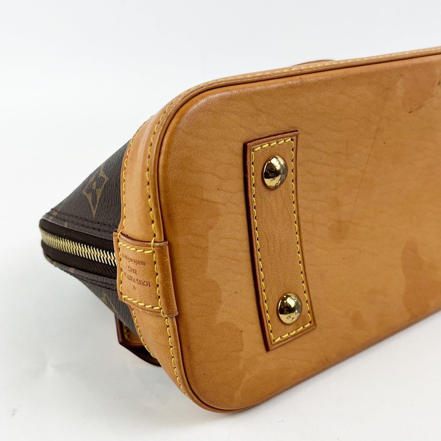 Louis Vuitton Alma Monogram Canvas con Finiture in Pelle