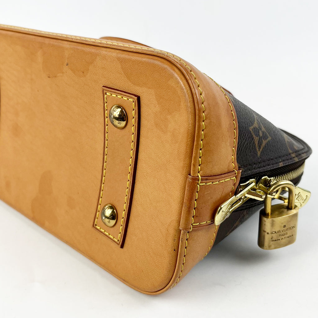 Louis Vuitton Alma Monogram Canvas with Leather Trim