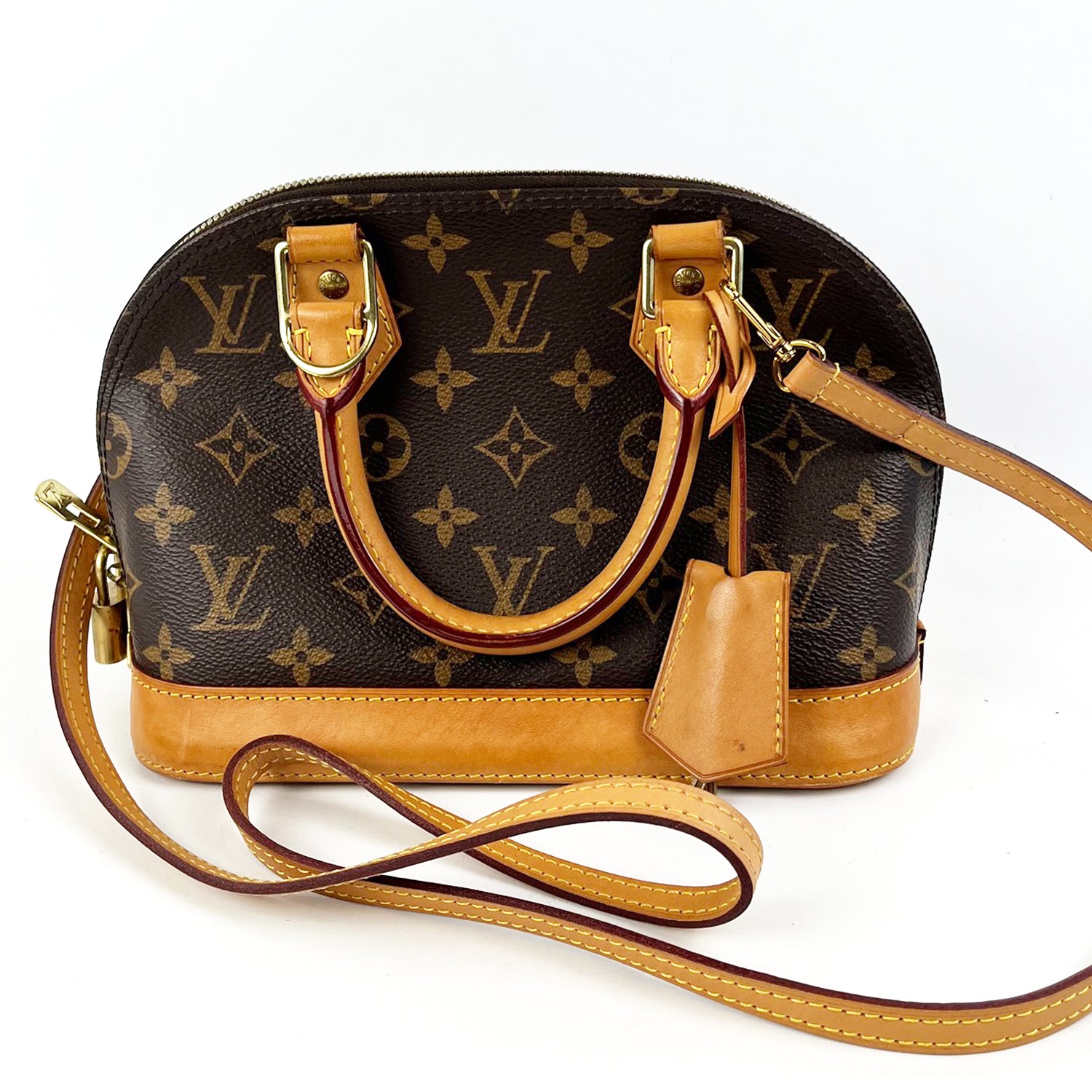 Louis Vuitton Alma Monogram Canvas with Leather Trim