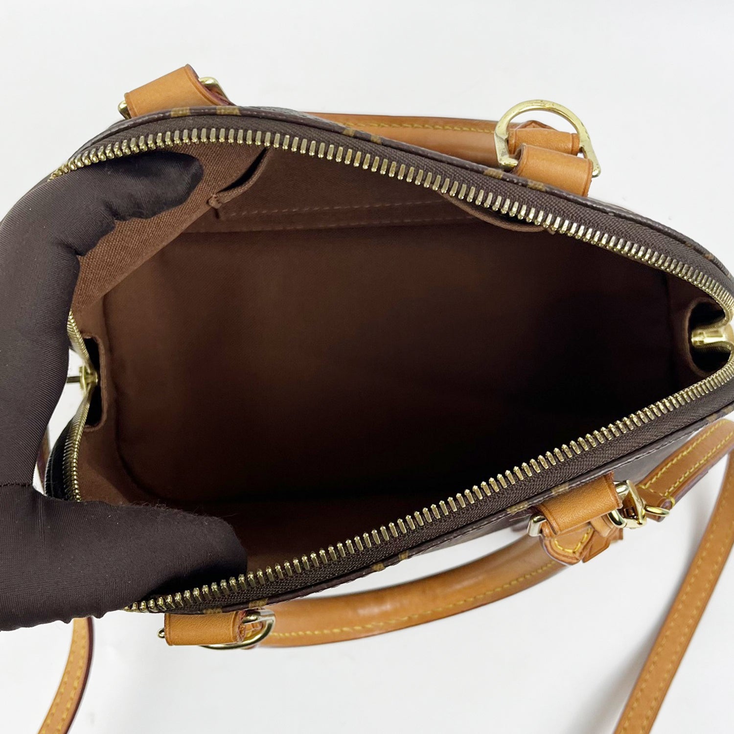 Louis Vuitton Alma Monogram Canvas with Leather Trim