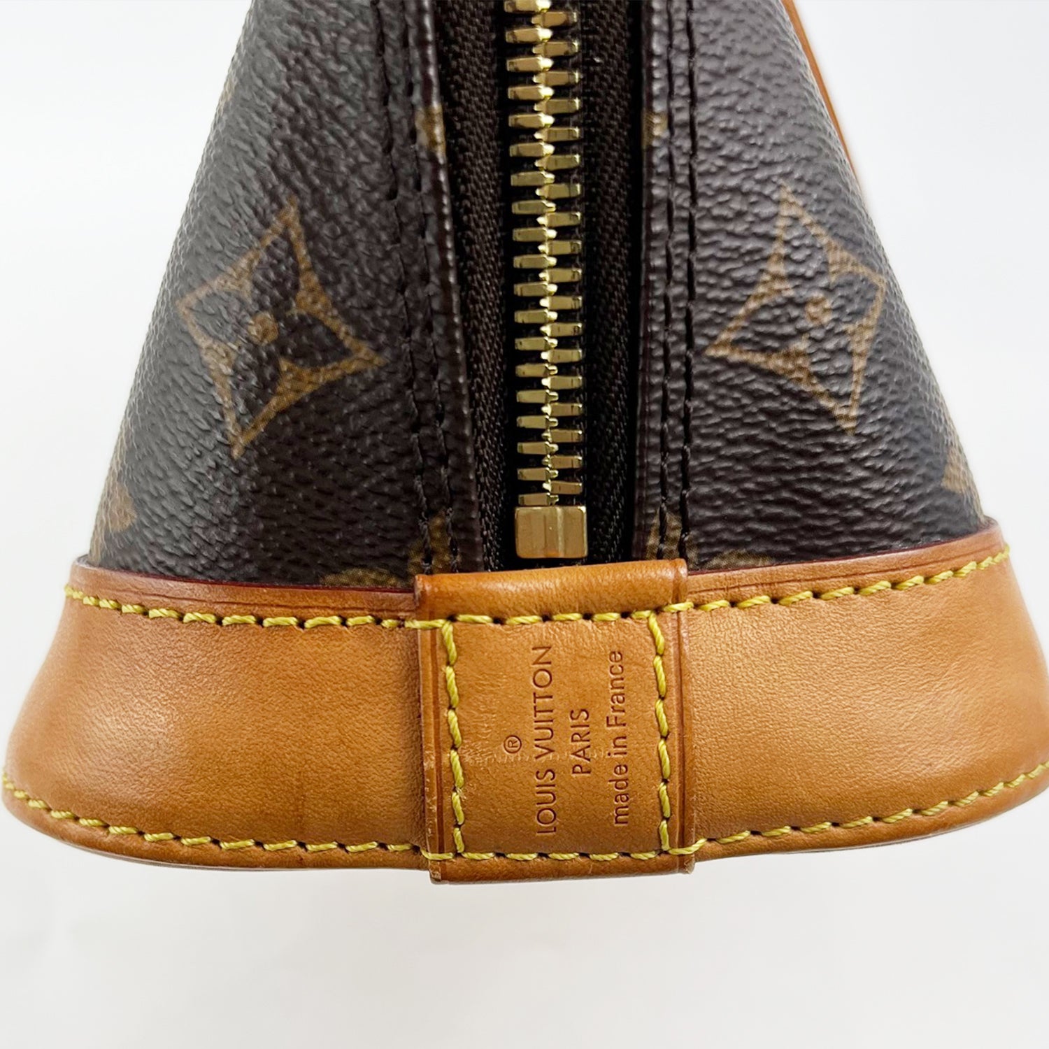 Louis Vuitton Alma Monogram Canvas with Leather Trim