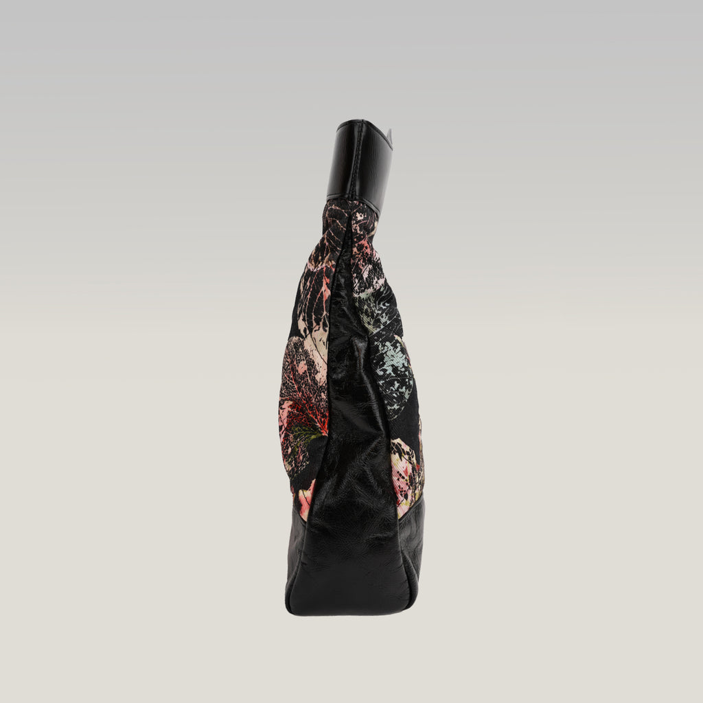 Chanel 31 in tela trapuntata floreale e pelle nera