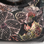 Chanel 31 in tela trapuntata floreale e pelle nera