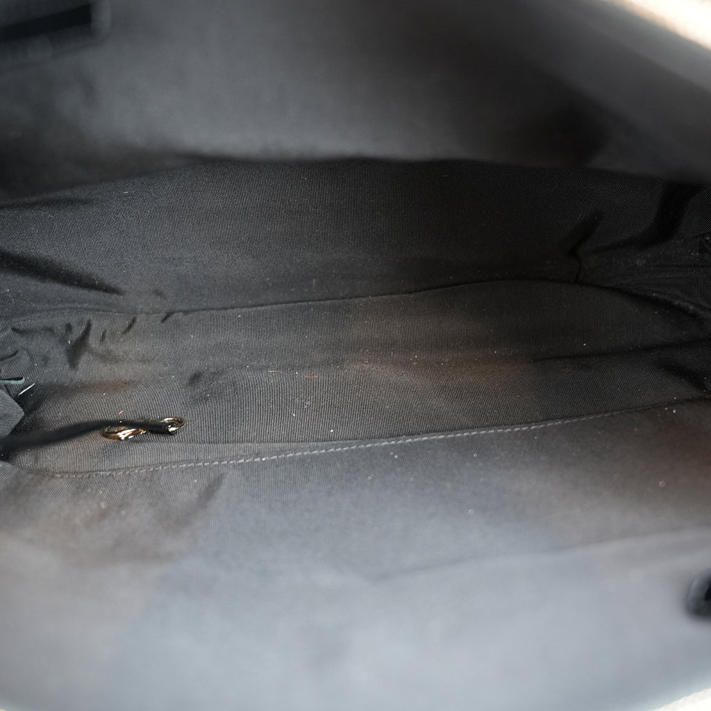 Chanel 31 in tela trapuntata floreale e pelle nera