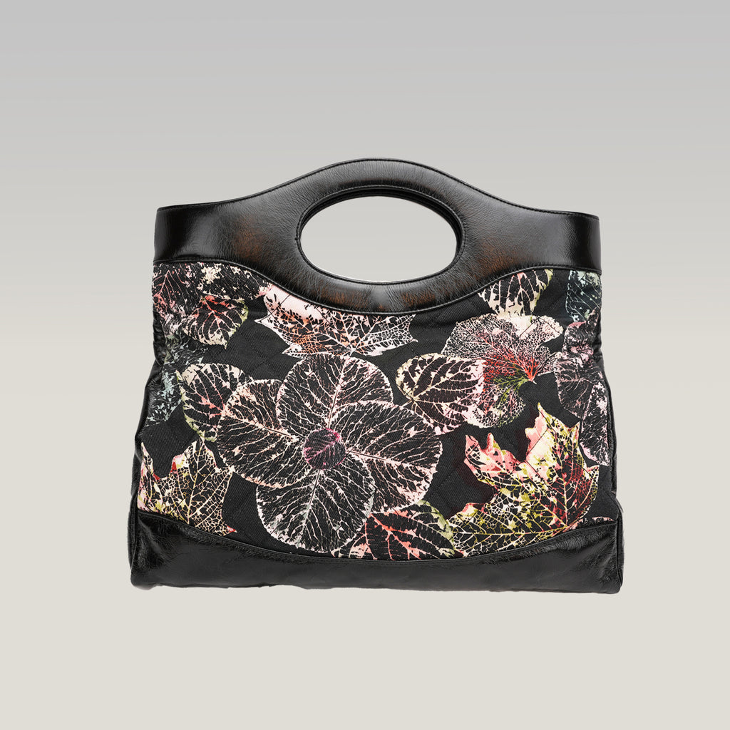 Chanel 31 in tela trapuntata floreale e pelle nera