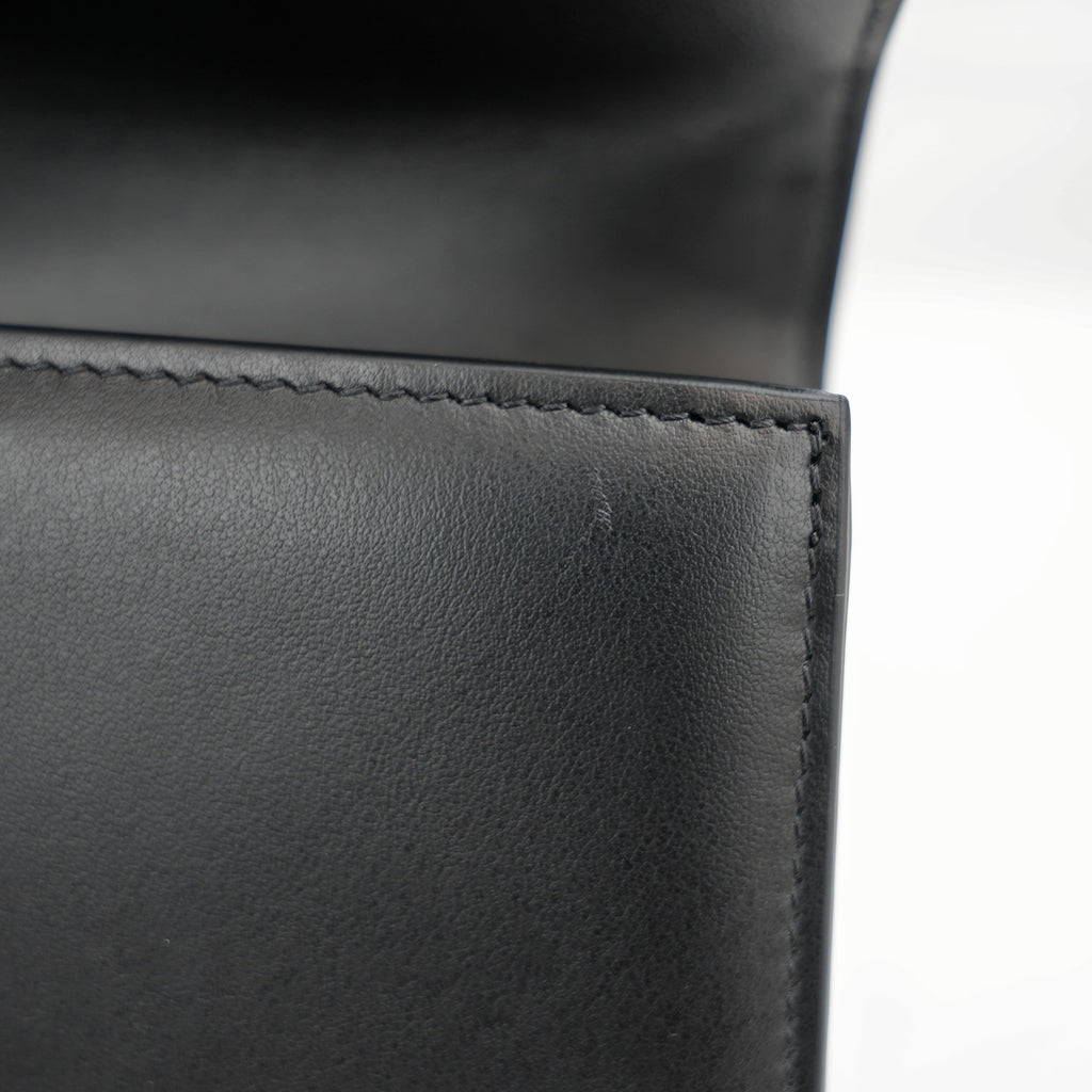 Jacquemus Il Grande Bambino nero con logo argento