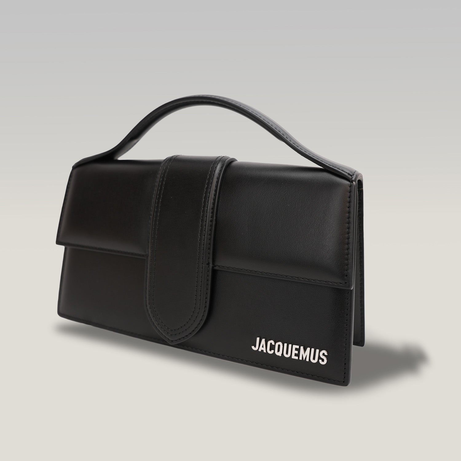 Jacquemus Il Grande Bambino nero con logo argento