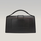 Jacquemus Il Grande Bambino nero con logo argento