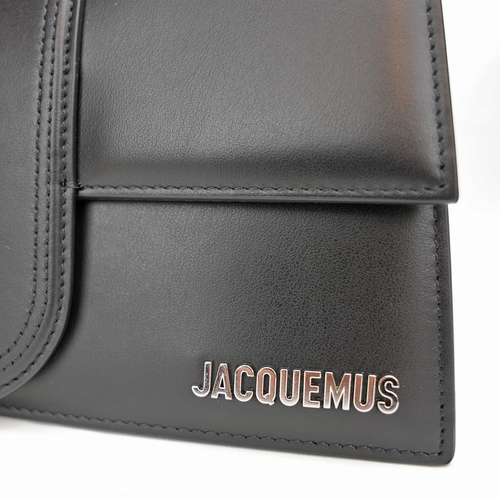 Jacquemus Il Grande Bambino nero con logo argento