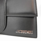 Jacquemus Il Grande Bambino nero con logo argento