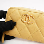 Portafoglio CHANEL in pelle trapuntata gialla con zip