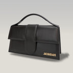 Jacquemus Le Grand Bambino nero con logo oro