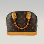 Louis Vuitton Alma BB Monogram Canvas con Finiture in Pelle Naturale