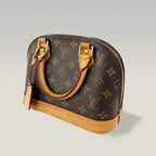 Louis Vuitton Alma BB Monogram Canvas con Finiture in Pelle Naturale