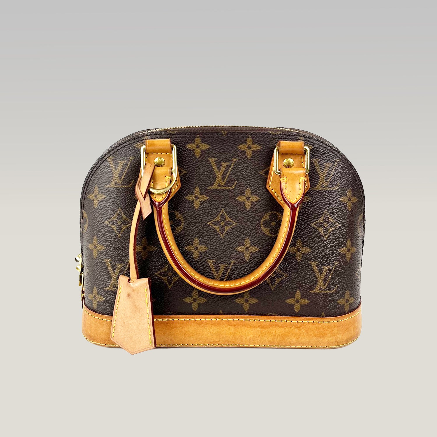 Louis Vuitton Alma BB Monogram Canvas con Finiture in Pelle Naturale