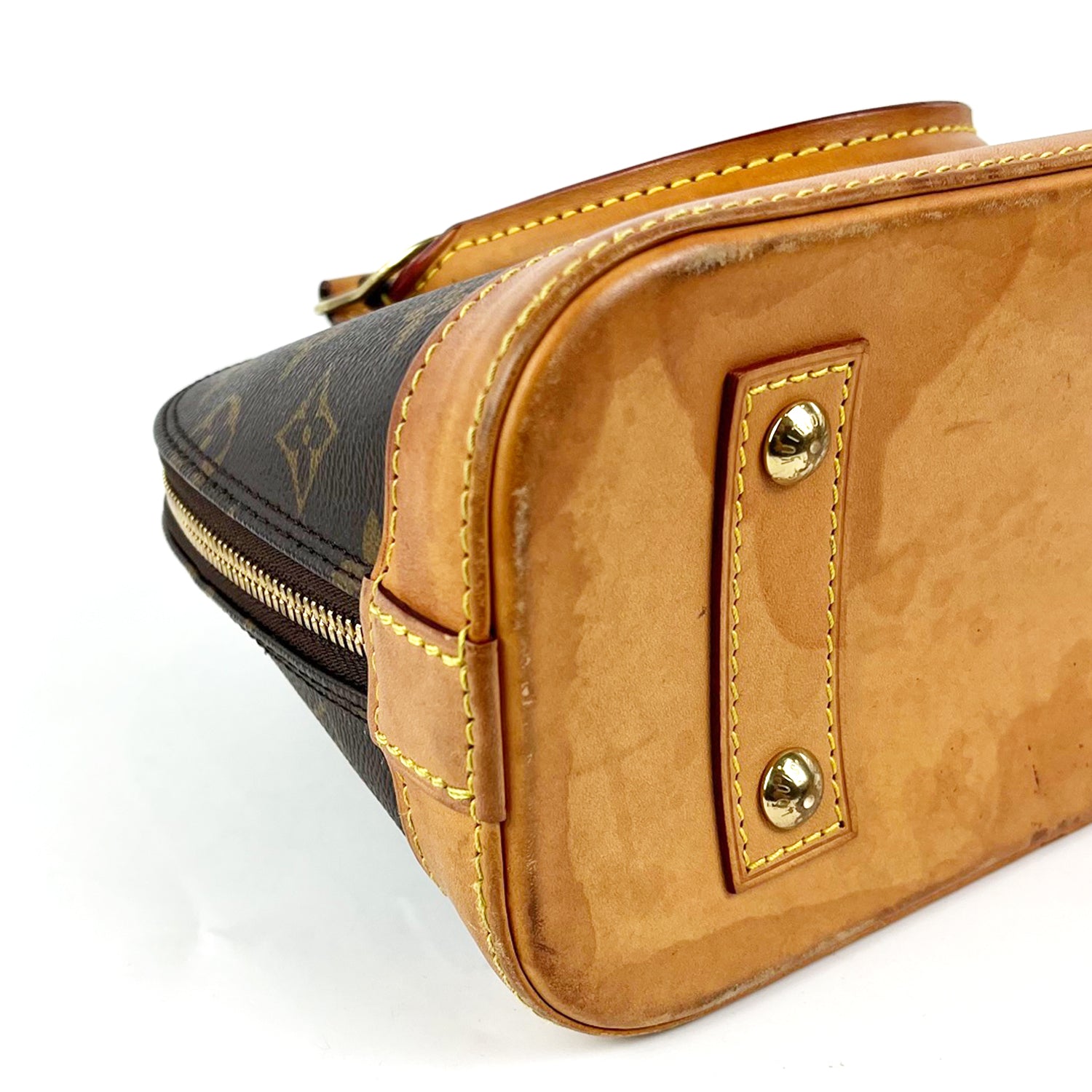 Louis Vuitton Alma BB Monogram Canvas con Finiture in Pelle Naturale