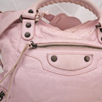 Balenciaga borsa City media in pelle rosa con borchie