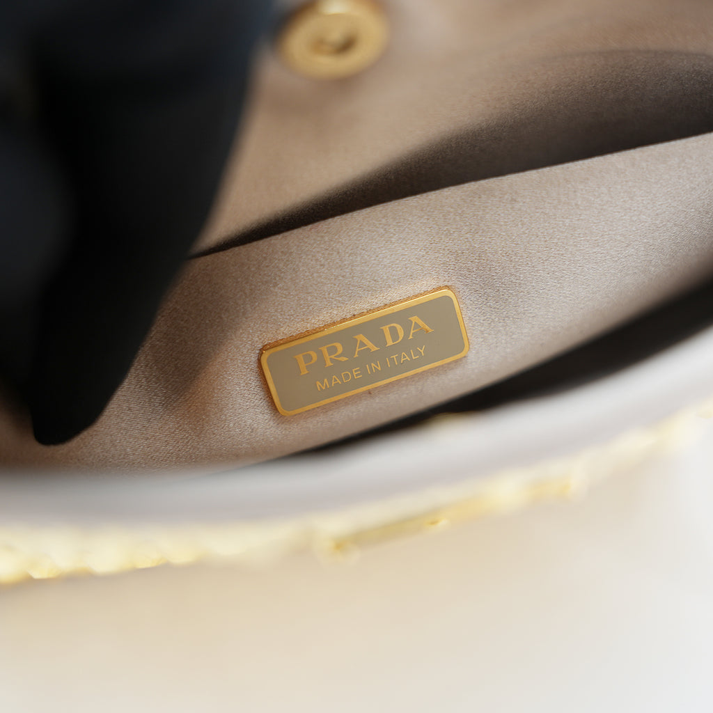 Prada Cleo mini borsa in raso color oro con cristalli