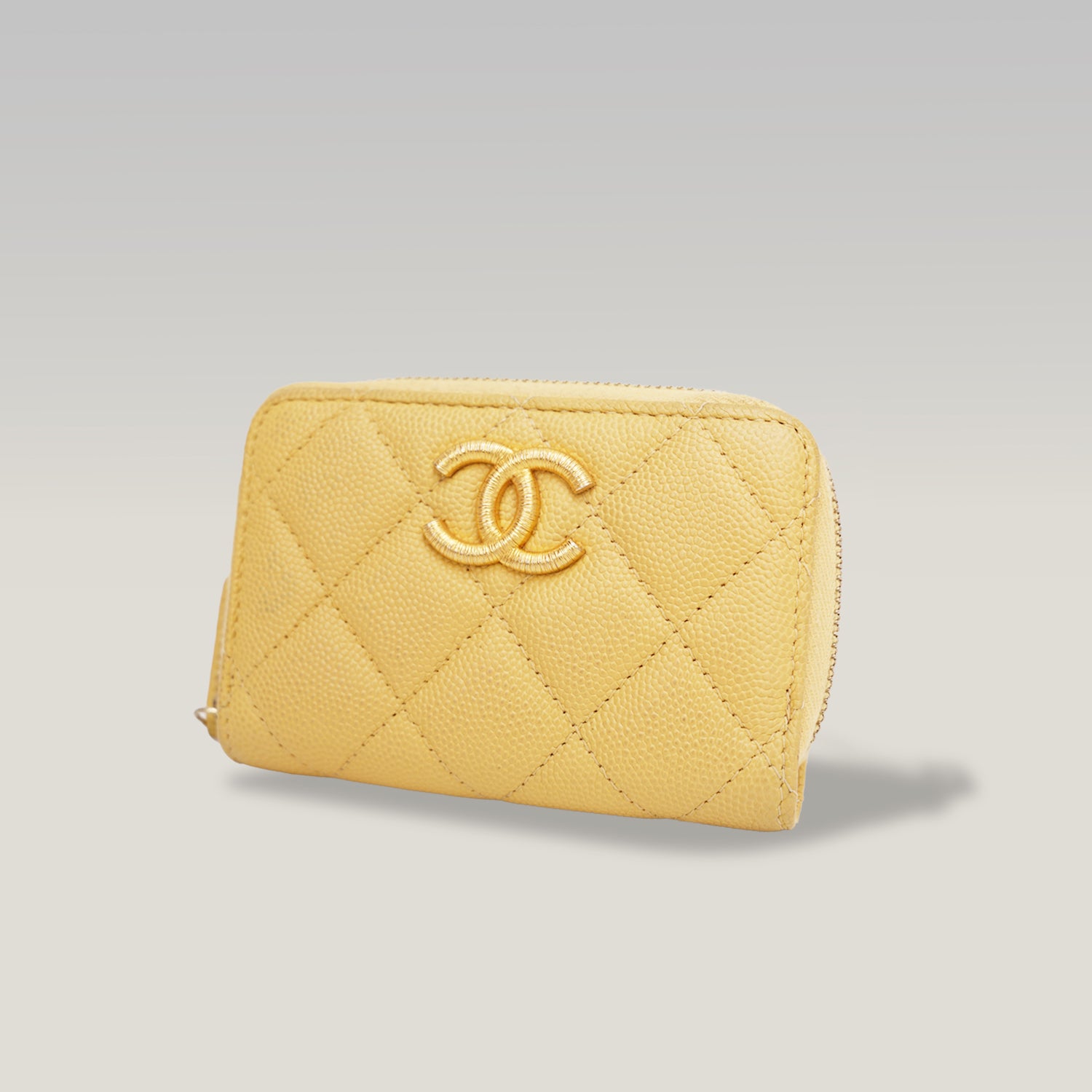 Portafoglio CHANEL in pelle trapuntata gialla con zip