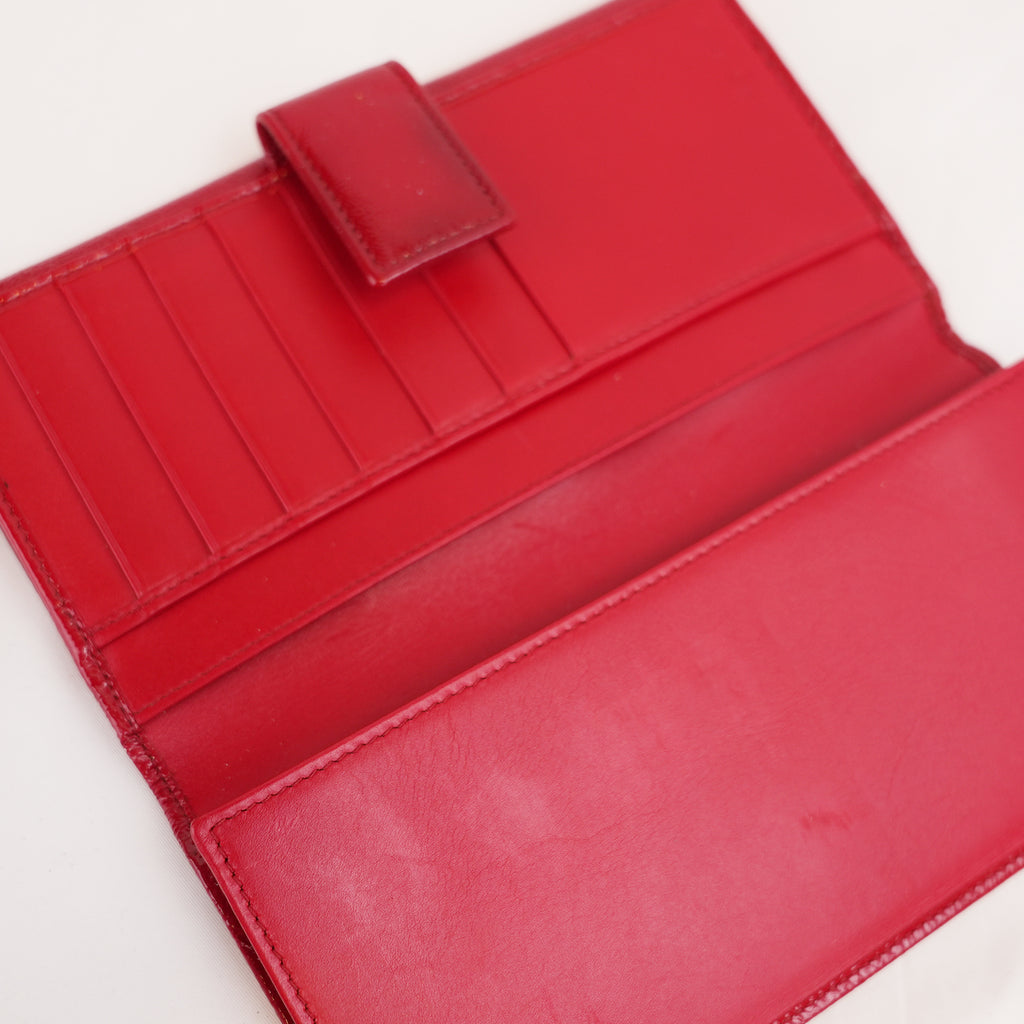 Saint Laurent Belle de Jour Pochette in Pelle Verniciata Rossa con Logo YSL Impresso