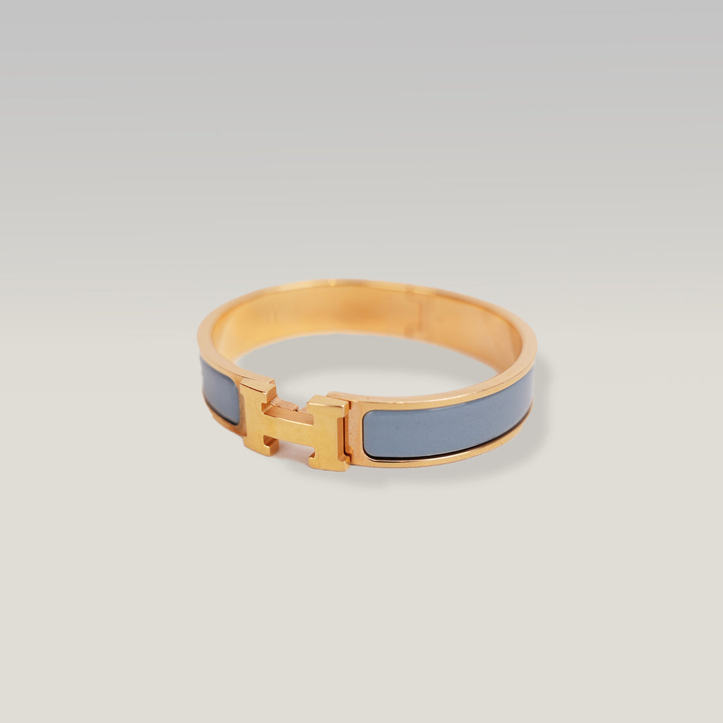 Hermès Clic H PM Bracciale Rigido in Metallo Dorato con Smalto Blu