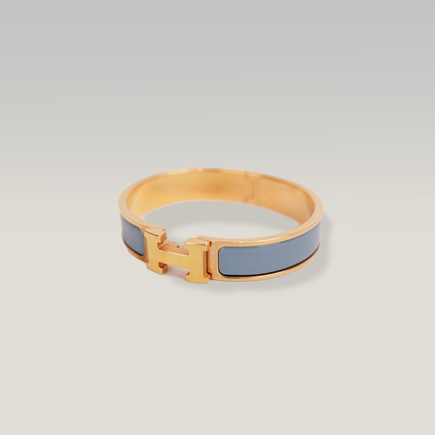 Hermès Clic H PM Bracciale Rigido in Metallo Dorato con Smalto Blu