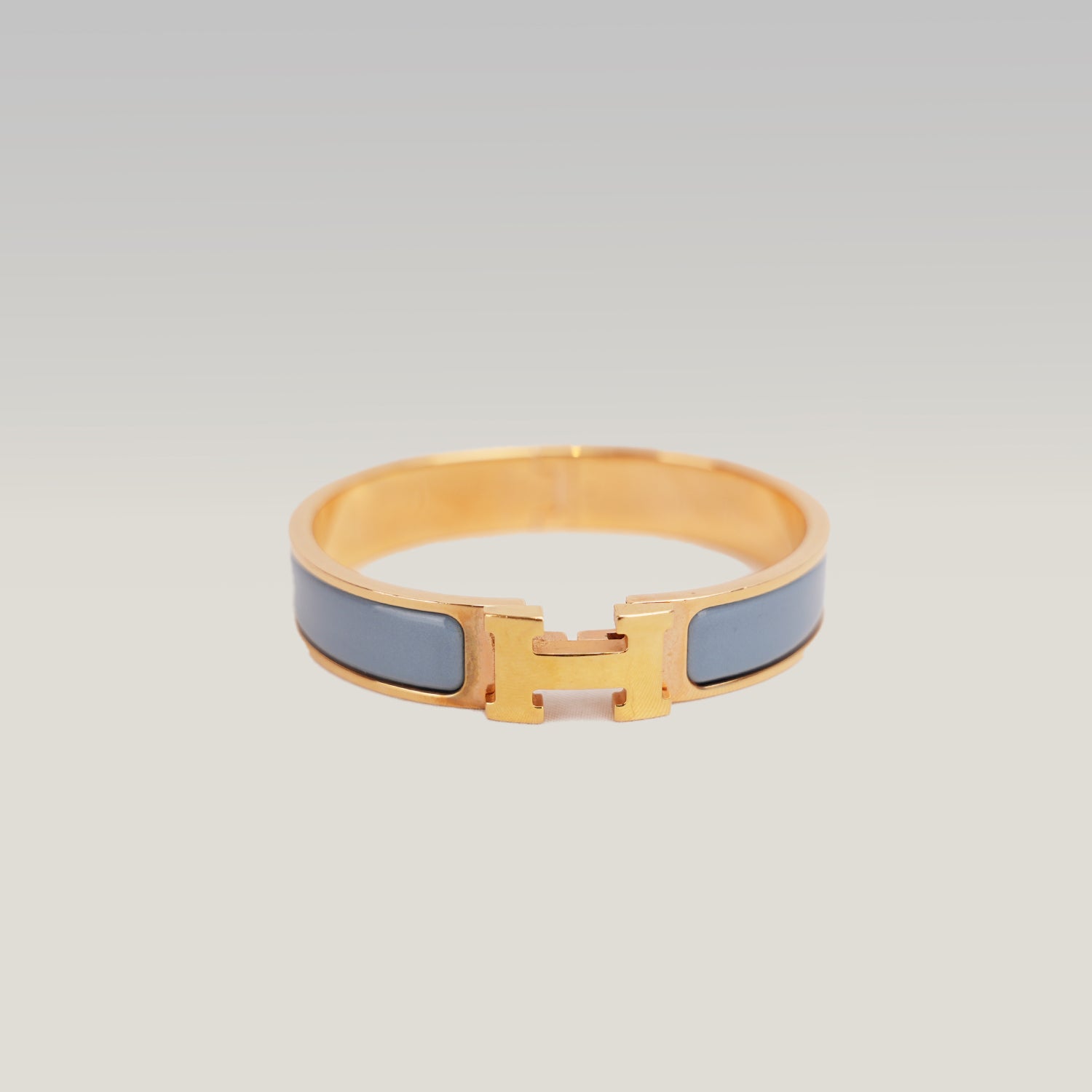 Hermès Clic H PM Bracciale Rigido in Metallo Dorato con Smalto Blu