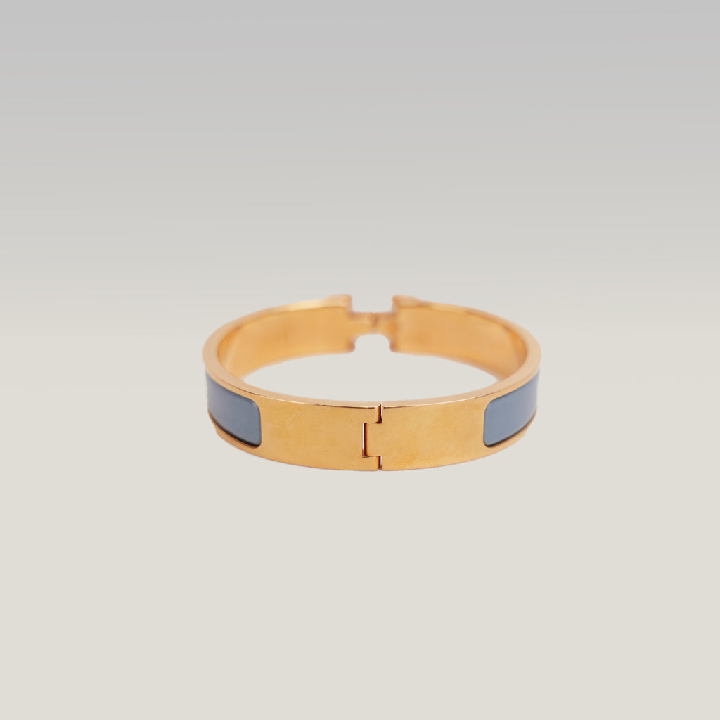 Hermès Clic H PM Bracciale Rigido in Metallo Dorato con Smalto Blu