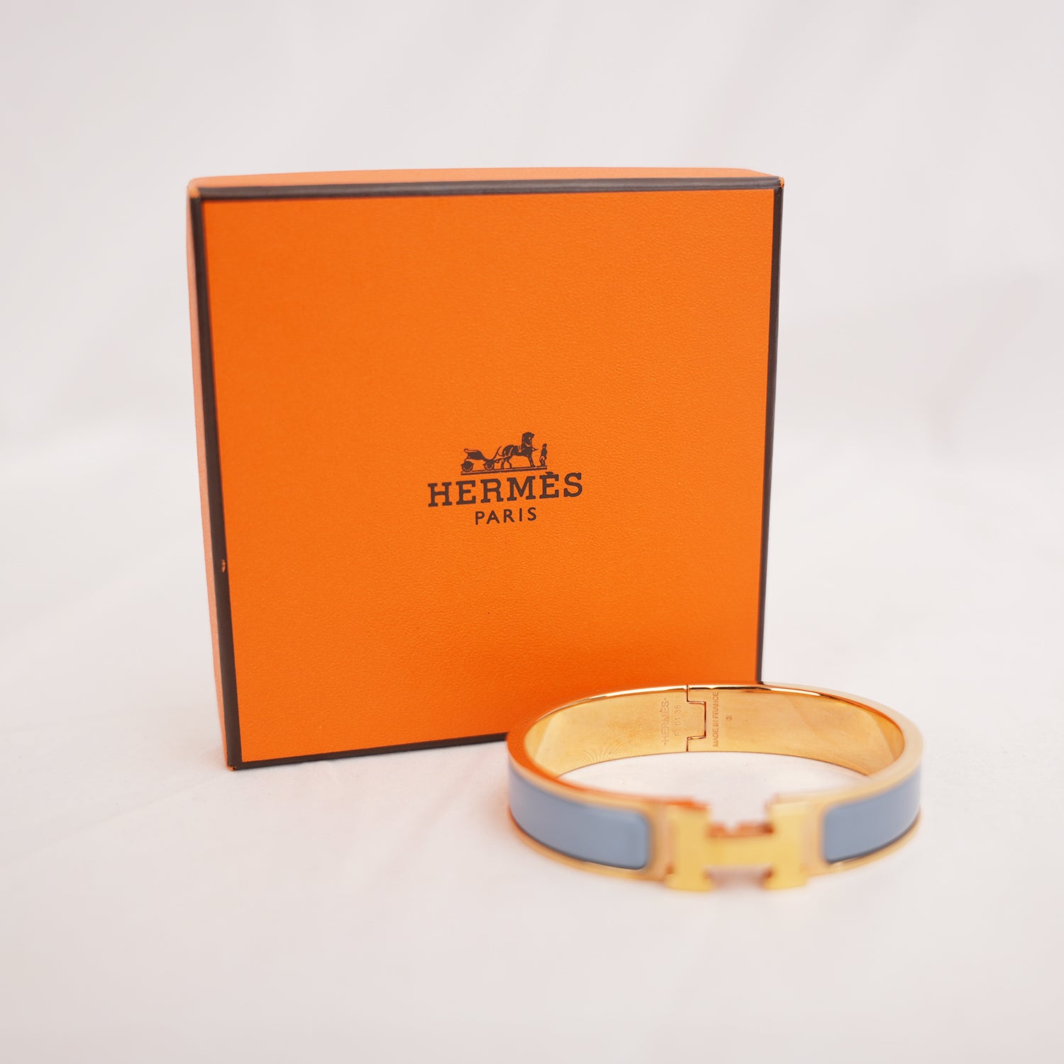 Hermès Clic H PM Bracciale Rigido in Metallo Dorato con Smalto Blu