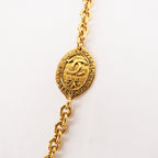 Chanel Cintura a Catena Vintage in Metallo Dorato con Medaglioni Ovali Logo CC e Incisione Paris