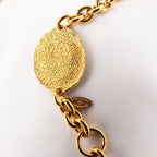 Chanel Cintura a Catena Vintage in Metallo Dorato con Medaglioni Ovali Logo CC e Incisione Paris