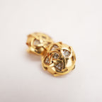 Chanel Orecchini a Clip Rotondi in Metallo Dorato con Logo CC e Strass – Bijoux Vintage