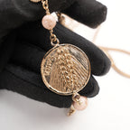 Chanel Collana Lunga Vintage del 2016 in Metallo Dorato con Perle, Medaglioni e Charm CC