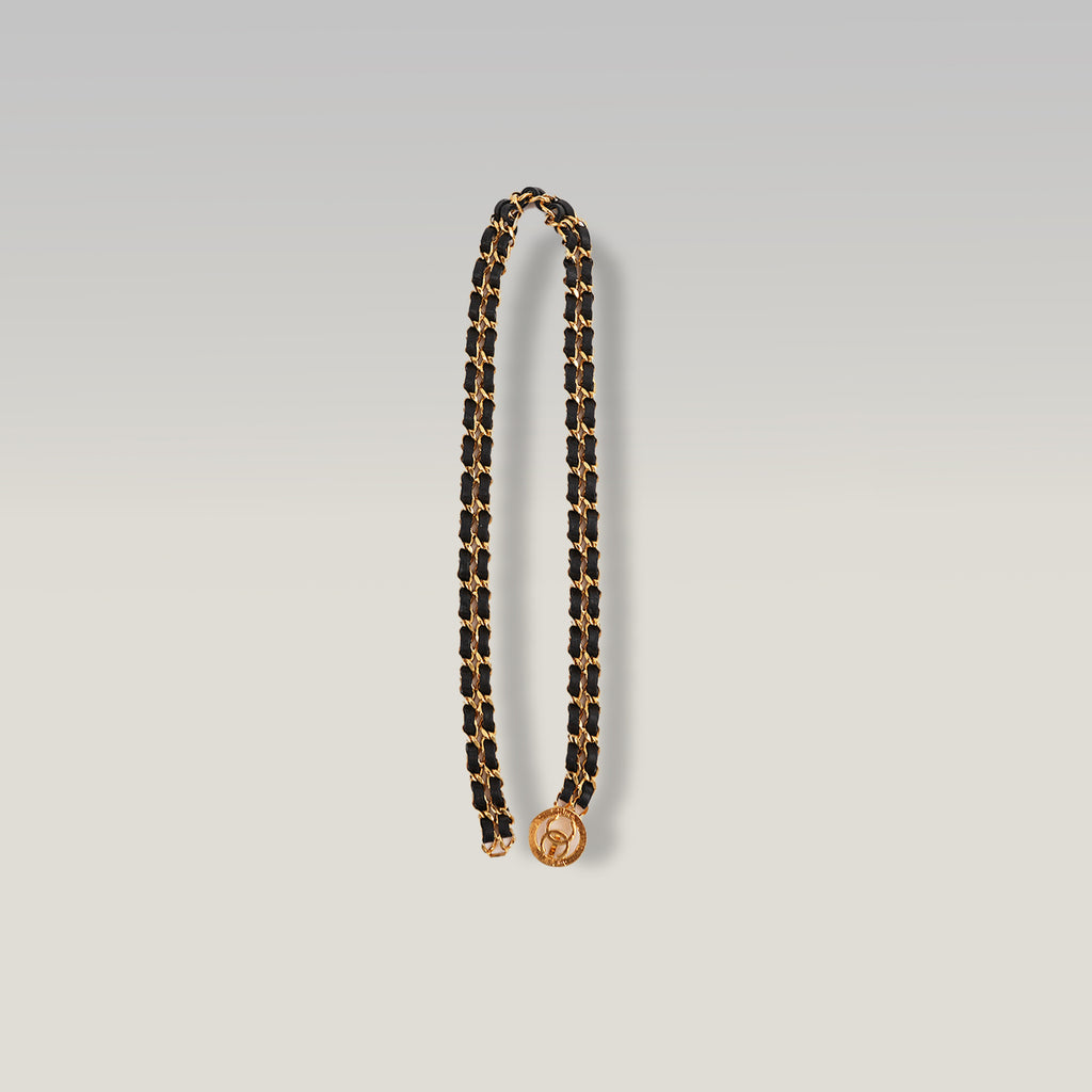 Chanel Cintura a Catena Vintage in Metallo Dorato Intrecciato con Pelle Nera e Chiusura Logo CC