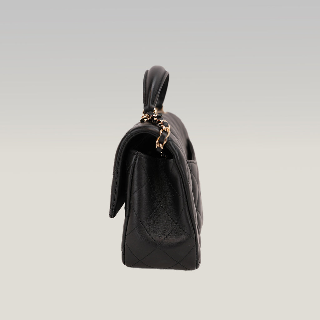 Chanel Mini Classic Flap con Manico in Pelle di Agnello Nera Matelassé e Metallo Dorato