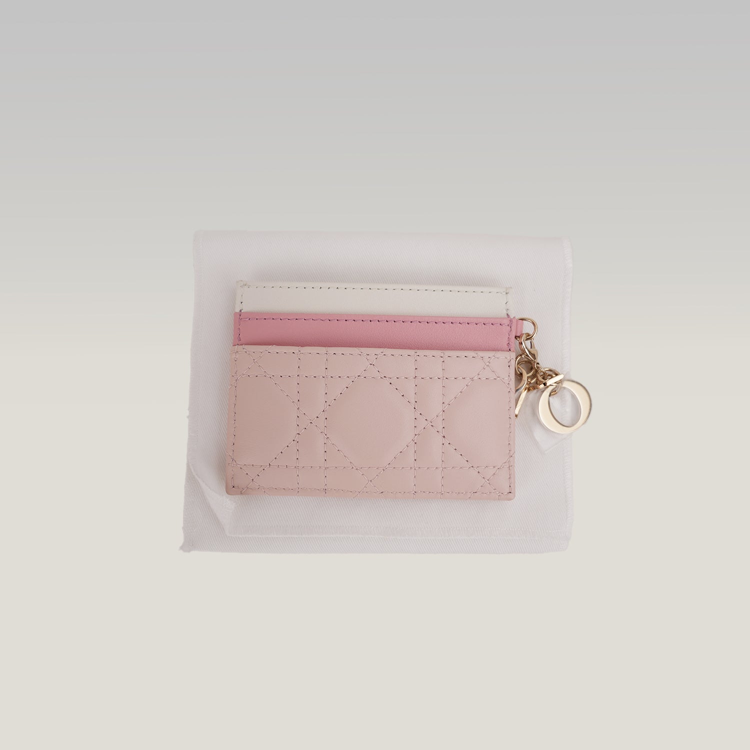 Portacarte Dior Lady Dior Rosa in Pelle Cannage con Charms D.I.O.R.