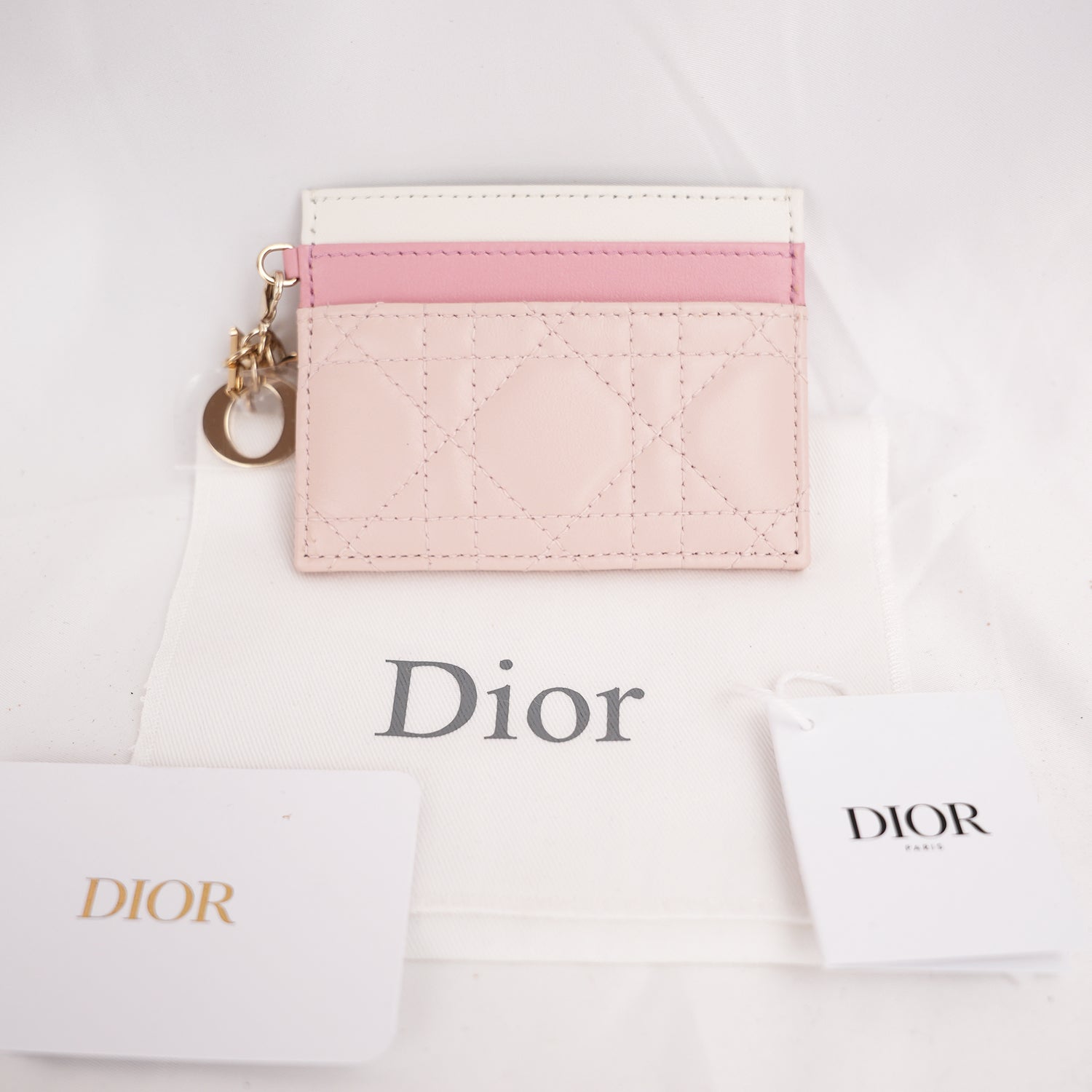 Portacarte Dior Lady Dior Rosa in Pelle Cannage con Charms D.I.O.R.