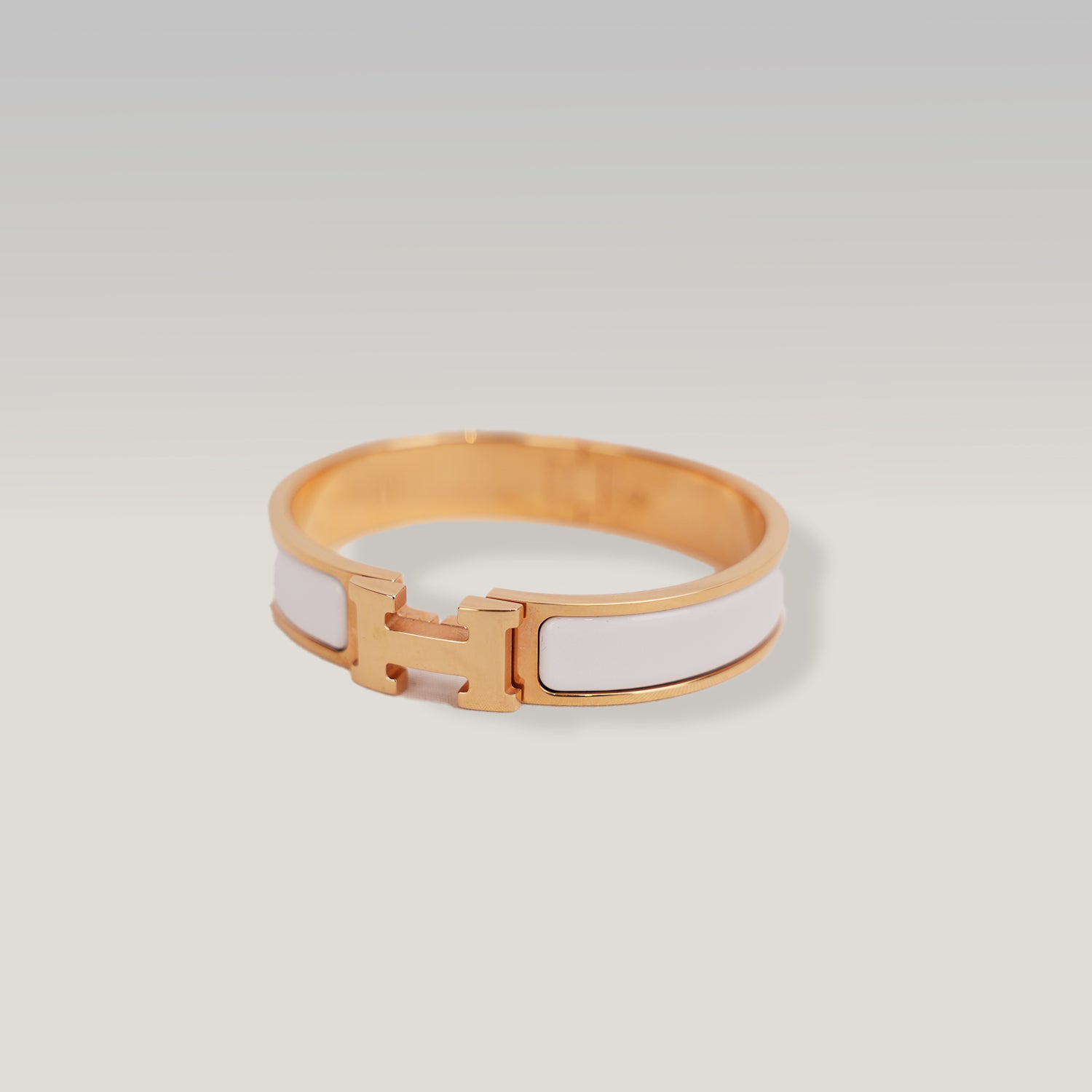 Hermès Clic Clac H PM Bracciale Rigido in Metallo Dorato con Smalto Bianco