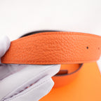 Hermès Cintura Reversibile H Martelée 85 in Pelle Arancione e Marrone Scuro con Fibbia H Argentata e Scatola