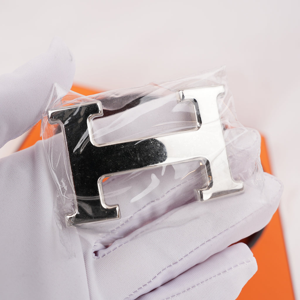 Hermès Cintura Reversibile H Martelée 85 in Pelle Arancione e Marrone Scuro con Fibbia H Argentata e Scatola