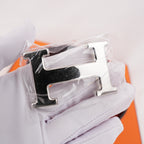 Hermès Cintura Reversibile H Martelée 85 in Pelle Arancione e Marrone Scuro con Fibbia H Argentata e Scatola