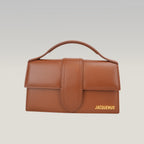 Jacquemus Le Bambino Long Borsa a Mano in Pelle Marrone con Logo Oro