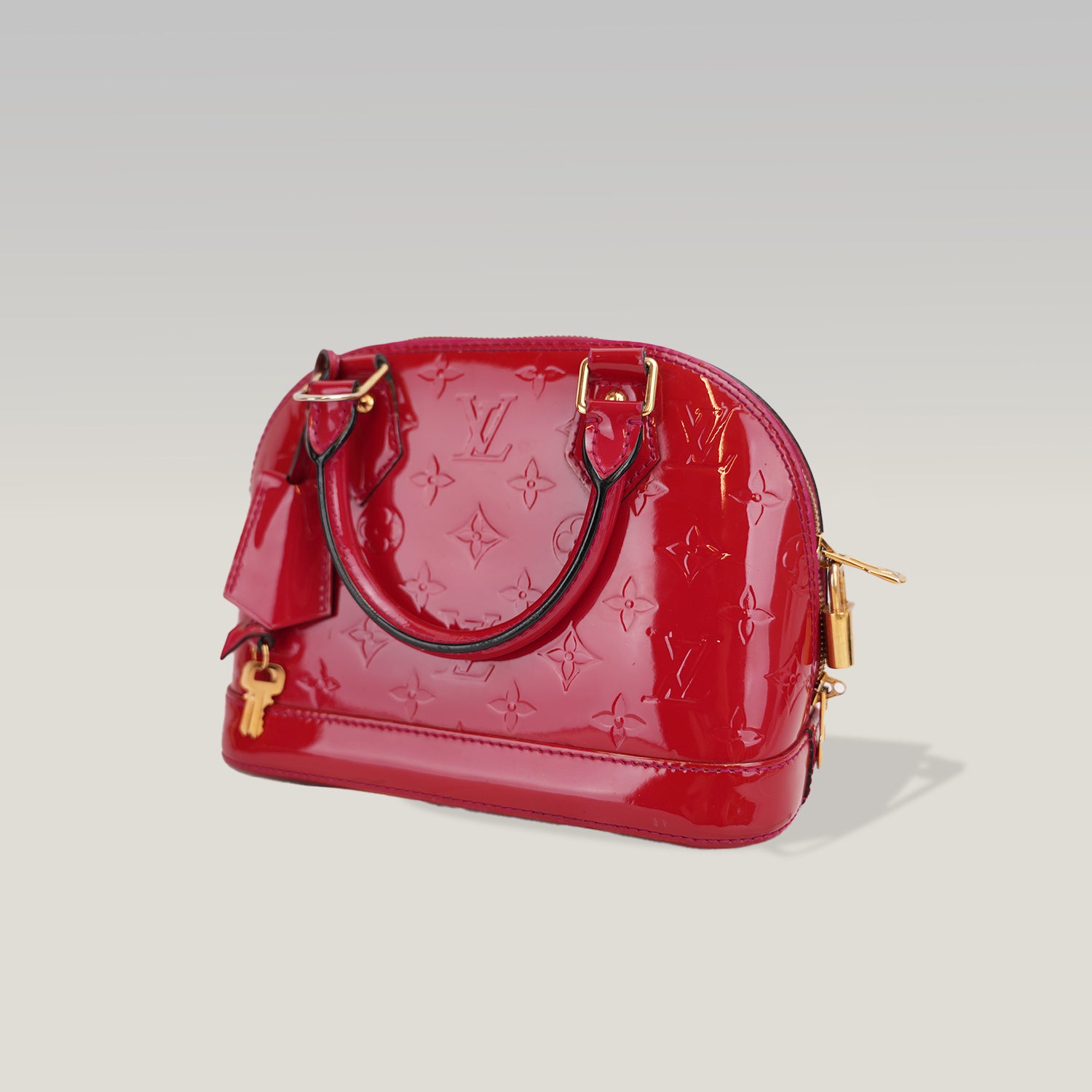 Louis Vuitton Alma BB Monogram Vernis Rosso Ciliegia – Borsa a Mano in Pelle Verniciata