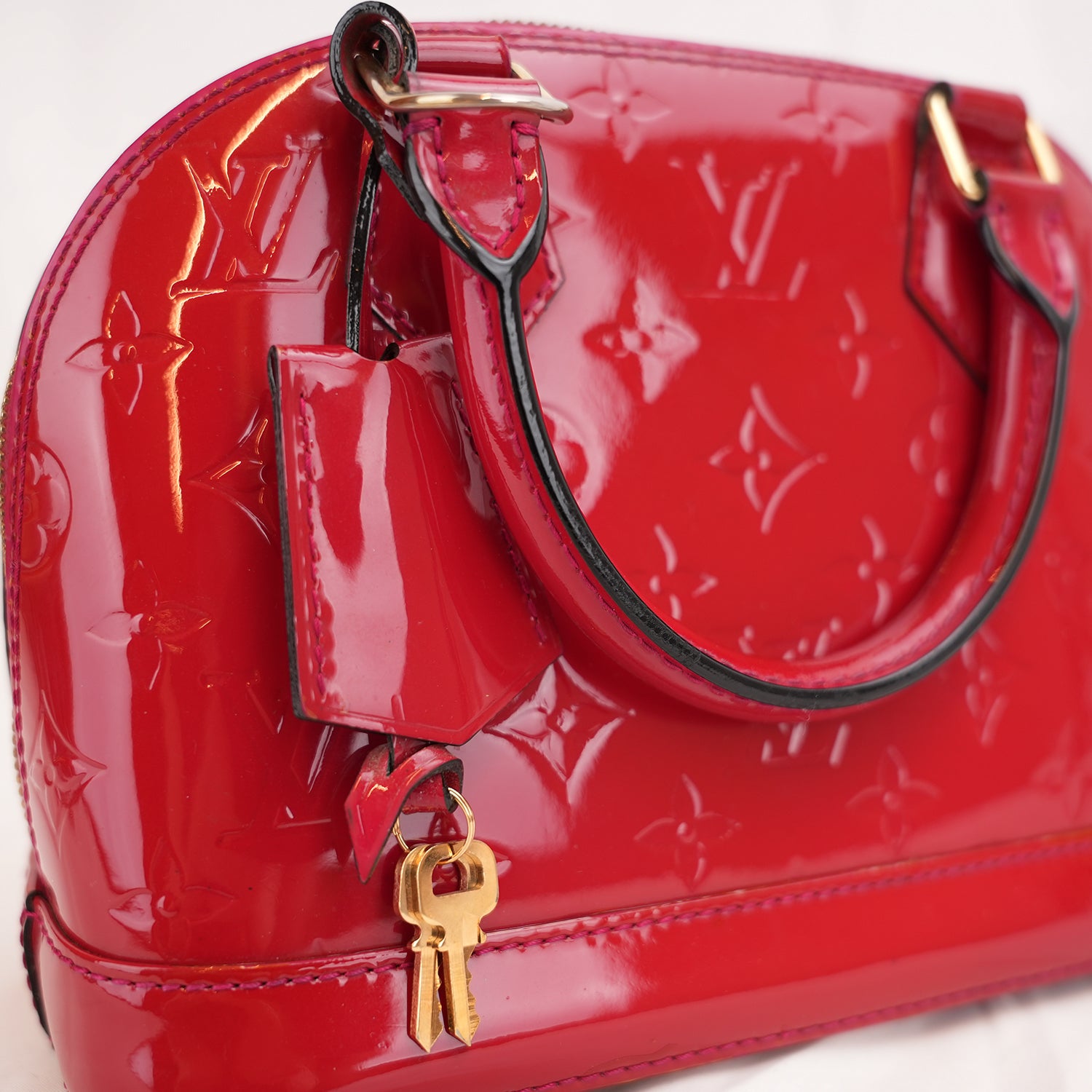 Louis Vuitton Alma BB Monogram Vernis Rosso Ciliegia – Borsa a Mano in Pelle Verniciata