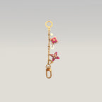 Louis Vuitton Blooming Flowers M67288 Charm per Borsa e Portachiavi in Metallo Dorato con Fiori Monogram Rosa e Fucsia